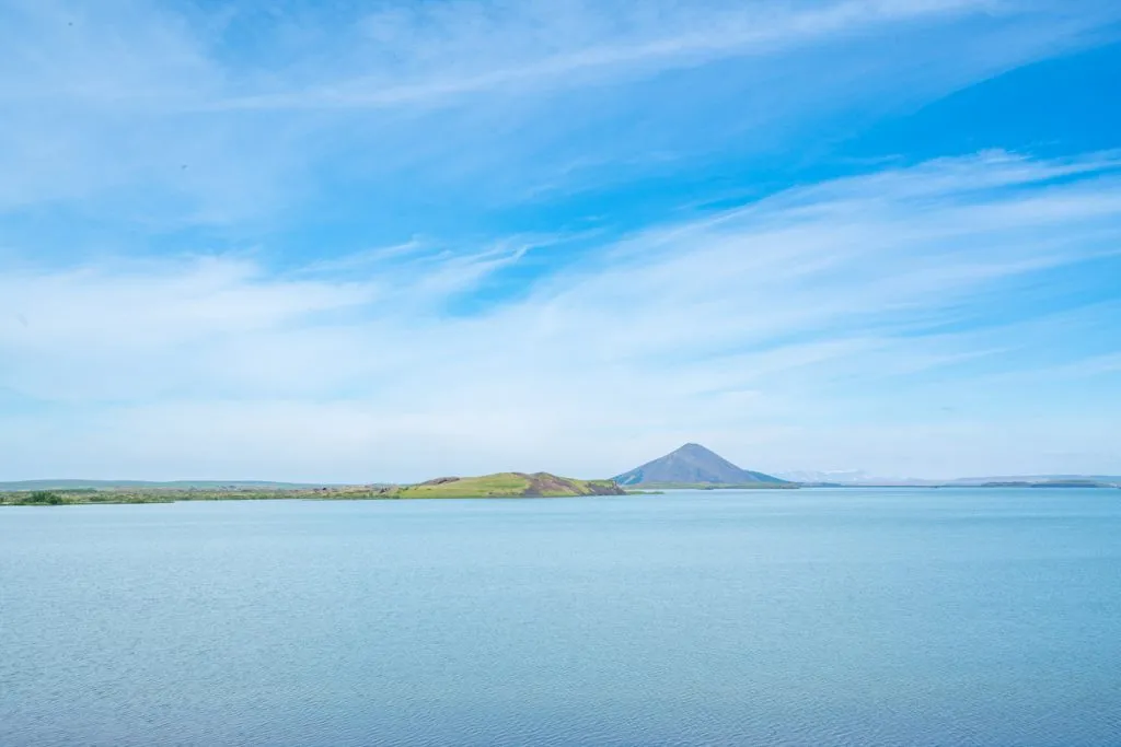 peaceful laky myvatn under blue sky