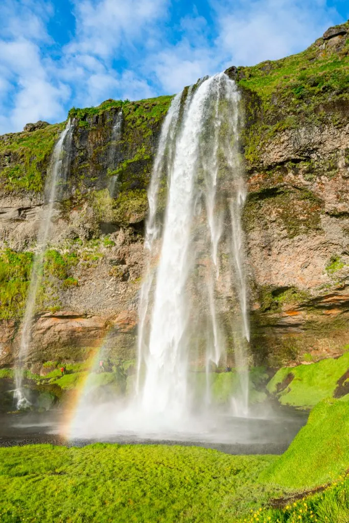 front of seljalansfoss waterfall, one of the best places to visit in iceland ring road stops