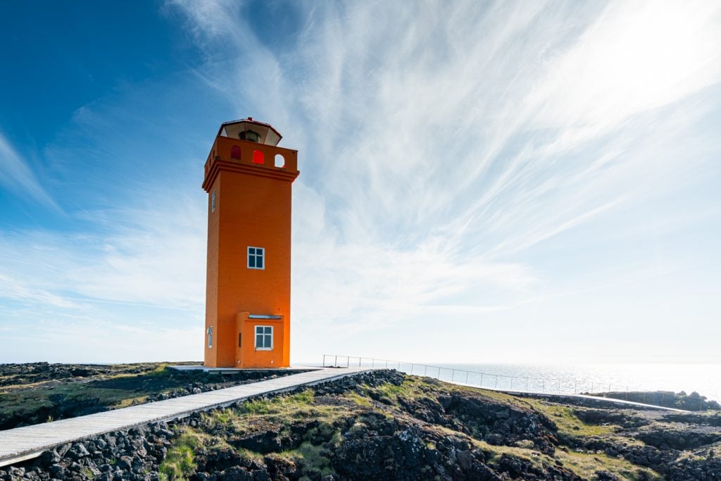 yellow lighthouse snaefellsness peninsula iceland with cloudy sky