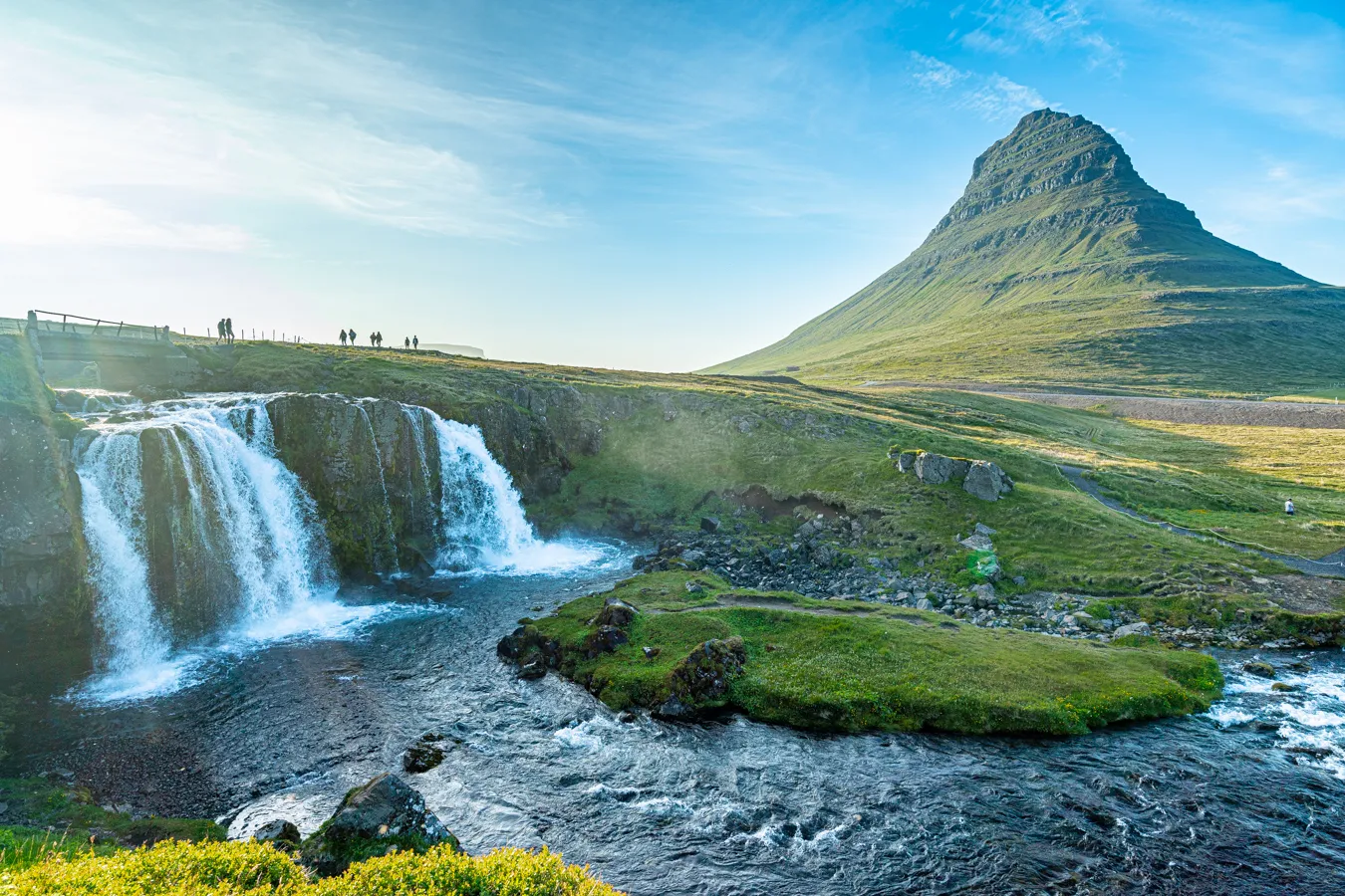 kirkfujell waterfall on a sunny night, one of the most dreamed of places planning a trip to iceland