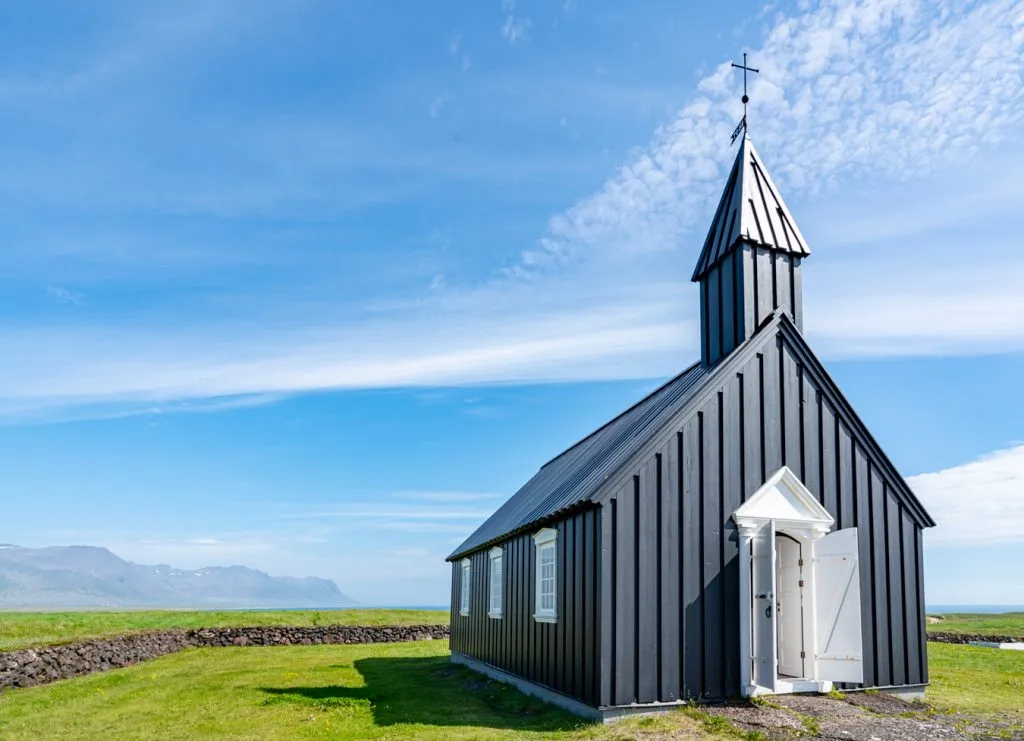black wood icelandic church on snaefelness peninsula, iceland books guide
