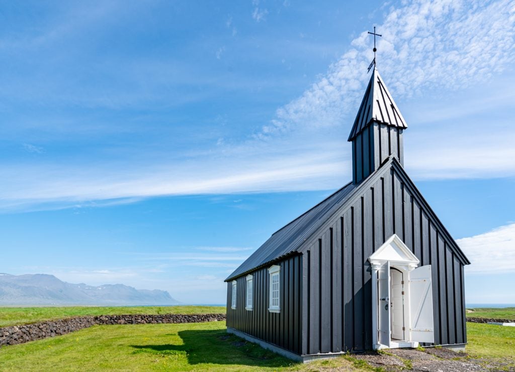 black wood icelandic church on snaefelness peninsula, iceland books guide