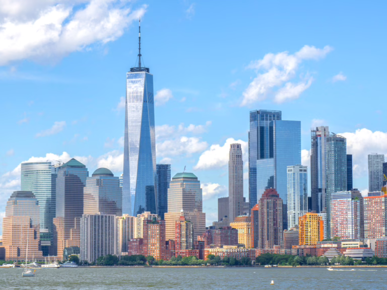 view of the financial district nyc from new york harbor ferry, one of the best things to do in the financial district new york city