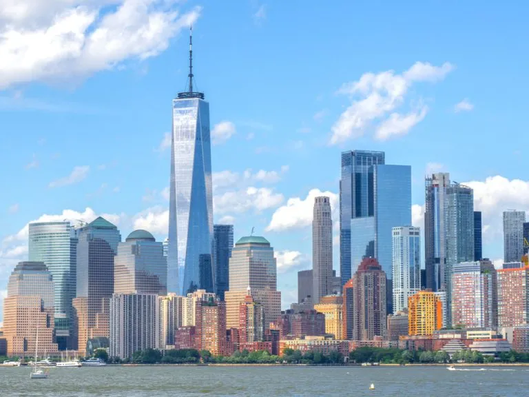 view of the financial district nyc from new york harbor ferry, one of the best things to do in the financial district new york city