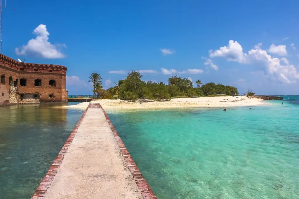 view of sea wall surrounded by caribbean at dry tortugas national park florida, one of the best secret vacation places to visit in usa