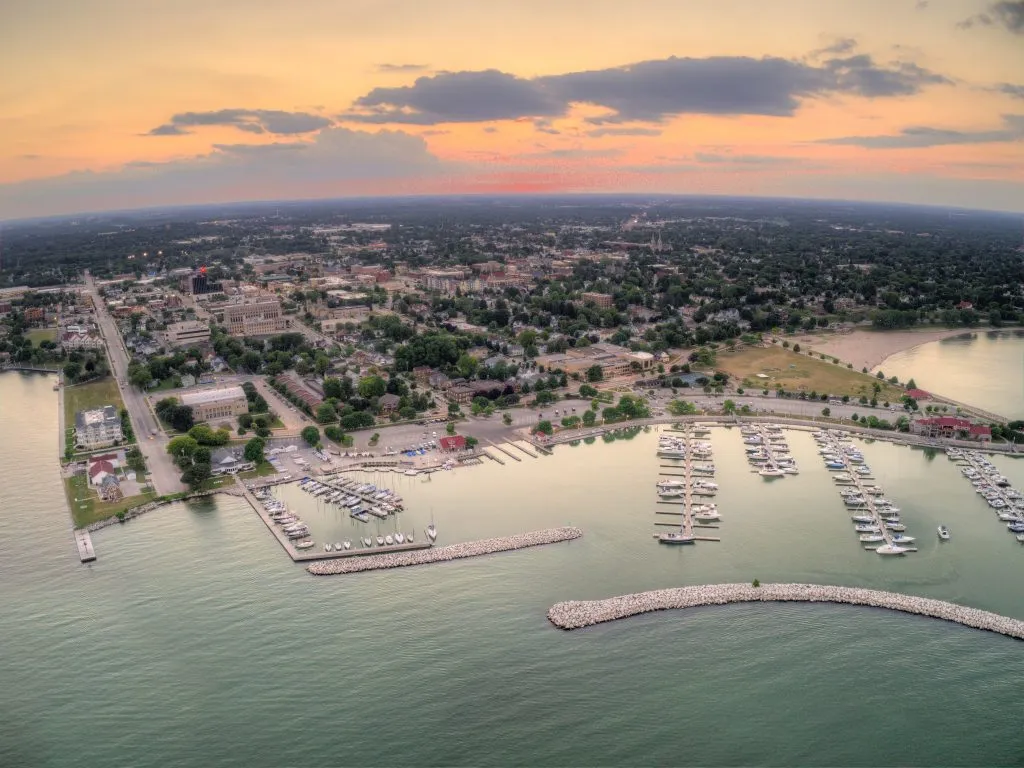 aerial view of sheboygan wisconsin harbor at sunset, one of the best hidden vacation spots in usa
