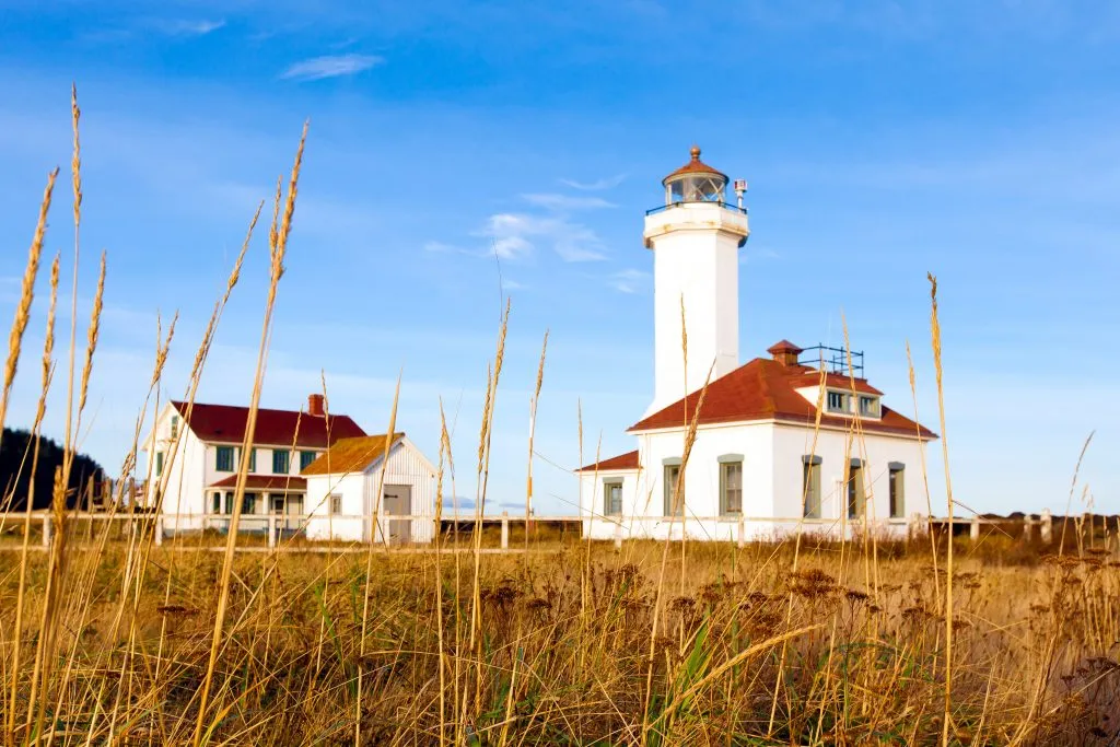 historic white lighthouse in port townsend, one of the best off the beaten path usa vacation destinations