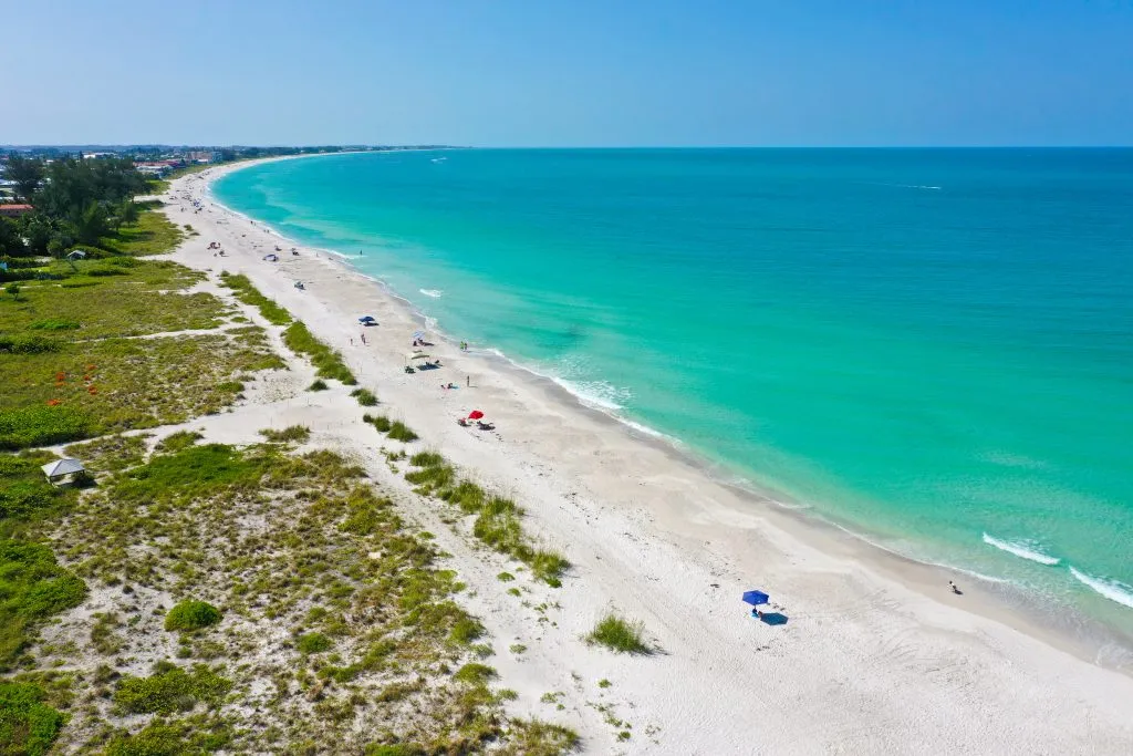 view of clear beach water in anna maria island florida, one of the best hidden gems in the united states