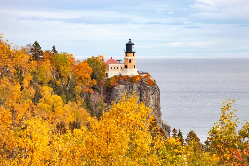 lighthouse on minnesota north shore in the fall, one of the best secret vacation spots in the us