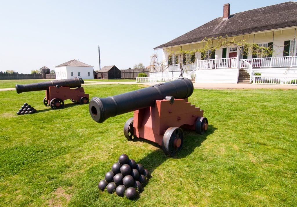 white historic building an cannons at historic site vancouver washington