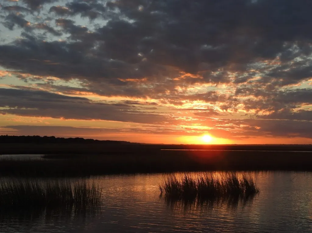 sunset over the marsh at hammocks beach state park north carolina