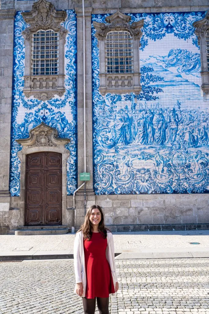 kate storm in front of igrejo do carmo azulejos, one of the best places to visit in porto in a day