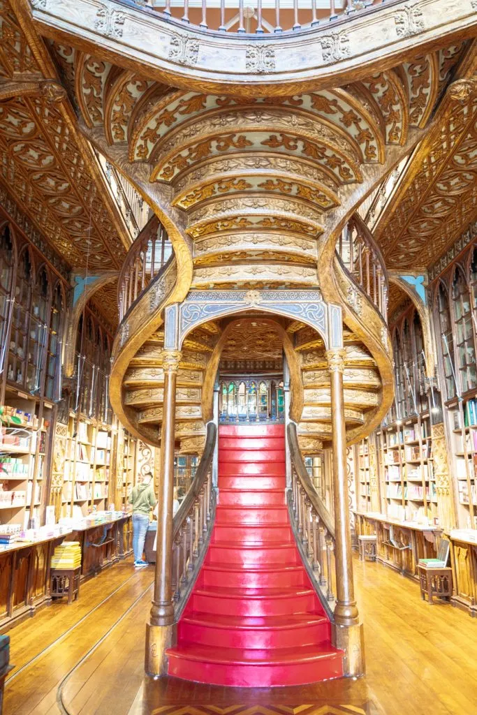 red staircase of livraria lello famous bookstore porto portugal