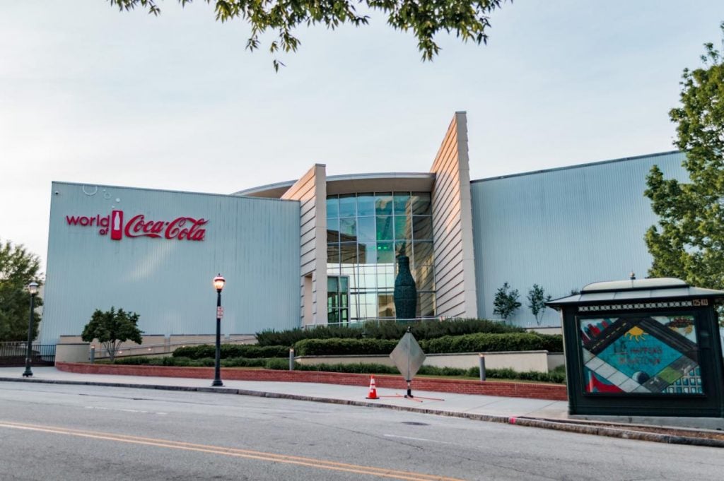 front facade of world of coca cola, one of the best things to do in atlanta this weekend