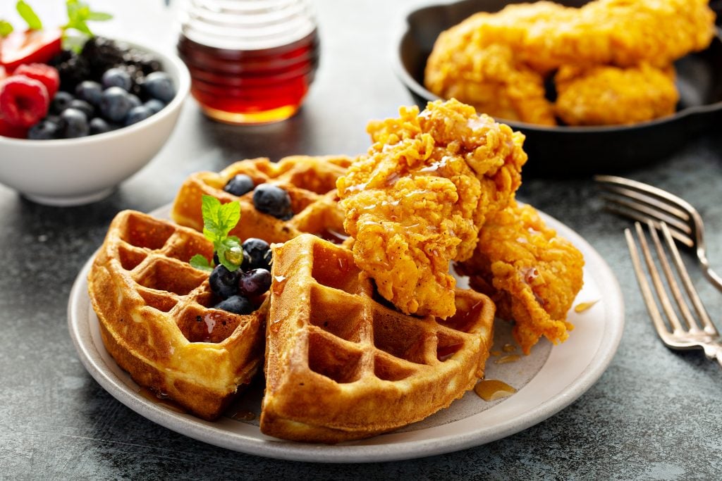 chicken and waffles at brunch, a fun meal to eat during a long weekend in atlanta itinerary
