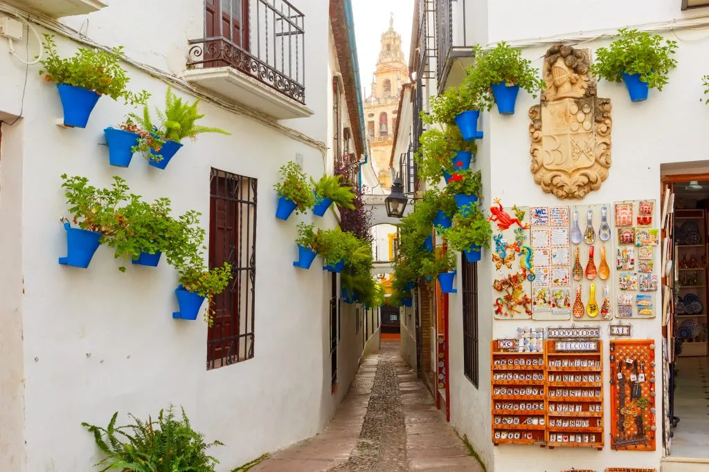 calleja de las flores with blue flower pots in cordoba spain