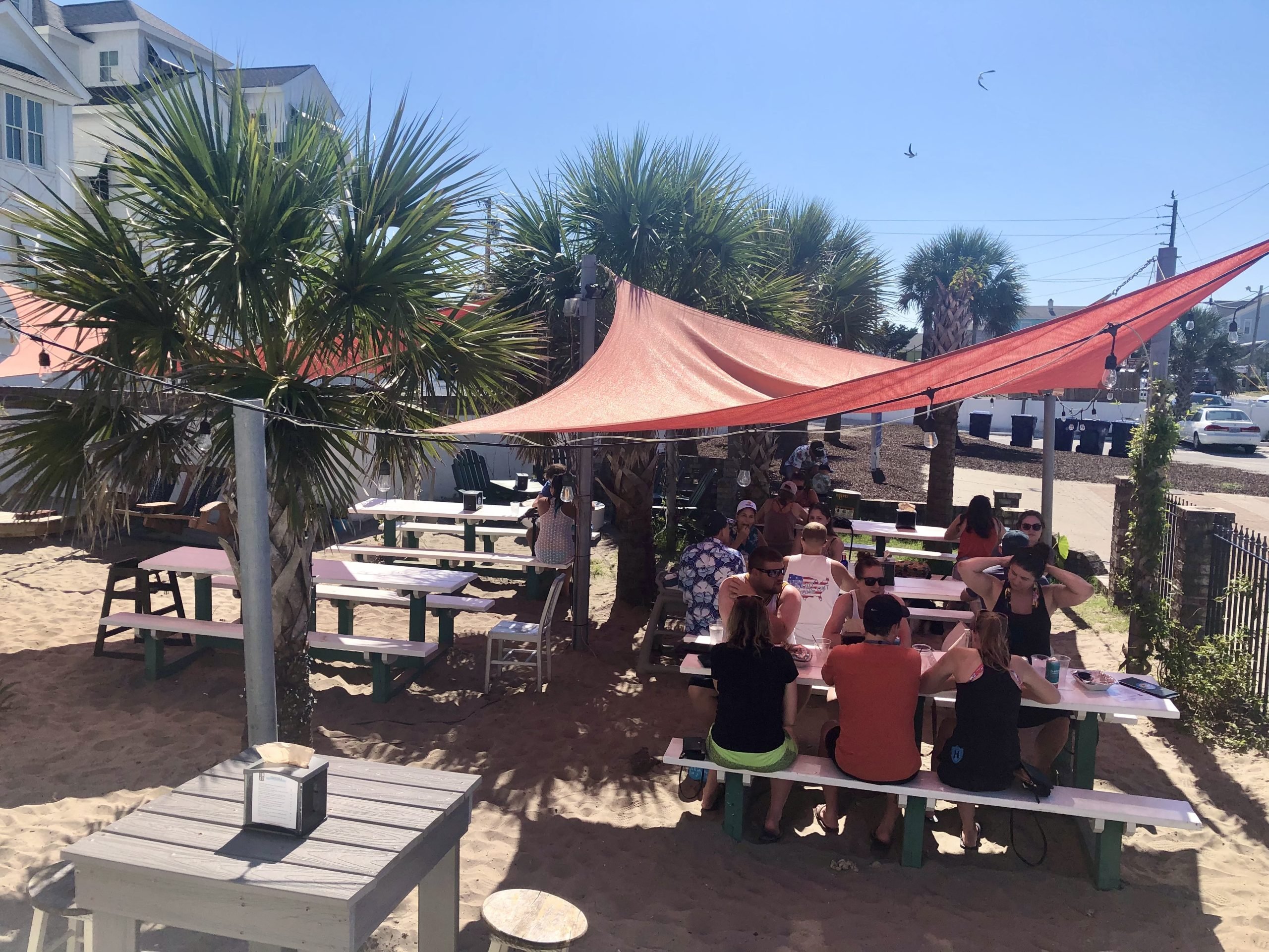 outdoor dining in atlantic beach nc at idle house biergarten, one of the best atlantic beach restaurants