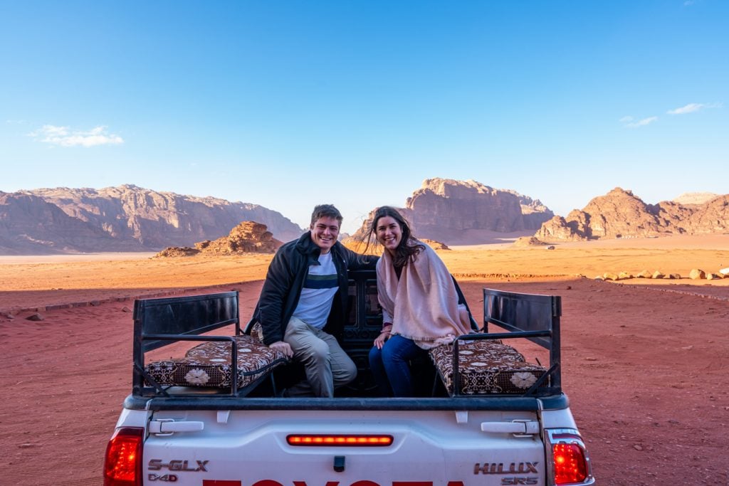 kate storm and jeremy storm in pickup truck wadi rum camp