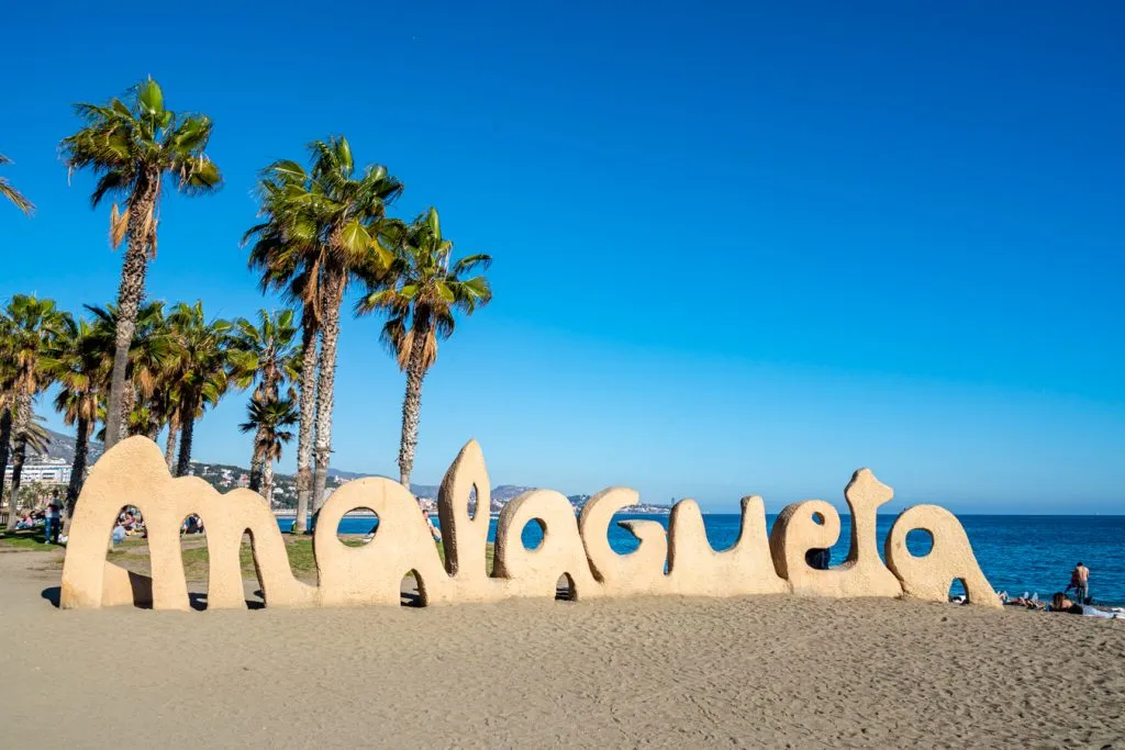 sand statue naming la malagueta beach in malaga spain