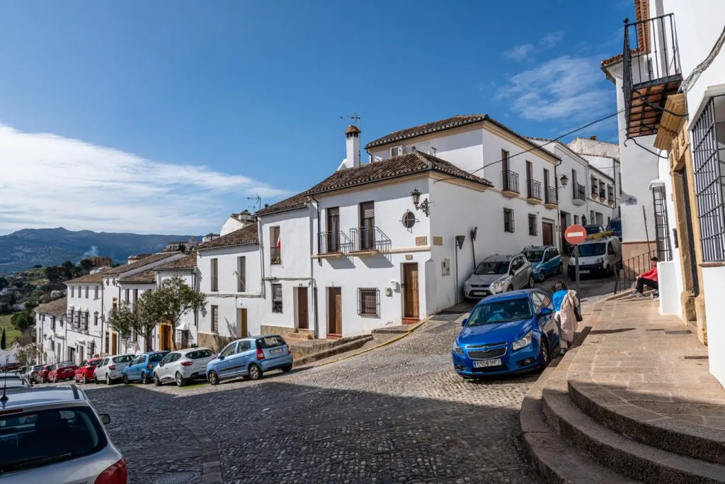 whitewashed buildings lining streets in ronda