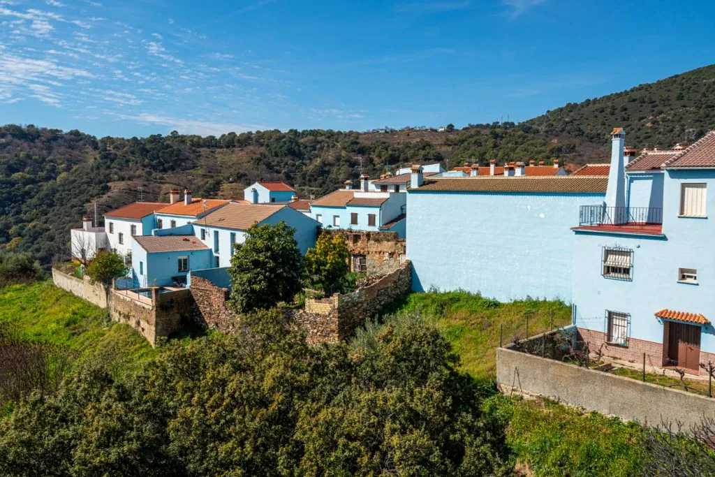 blue town spain with forest to the left