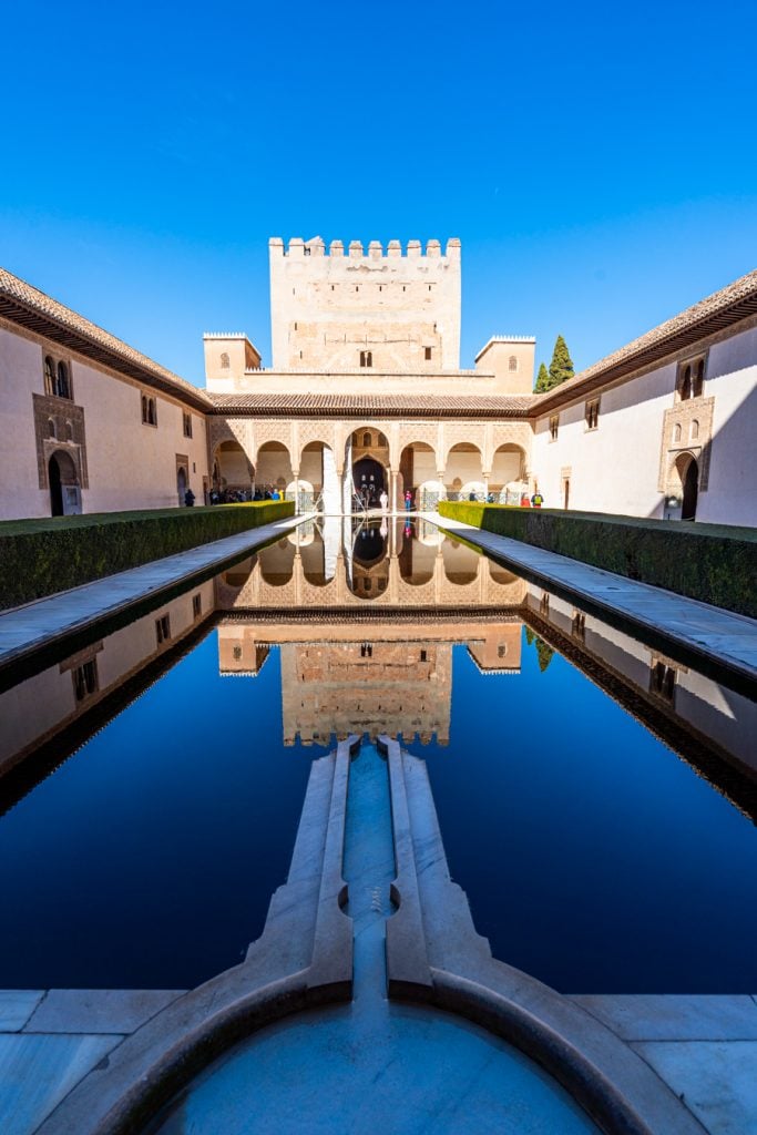 reflective pool of a palace as seen during alhambra visit