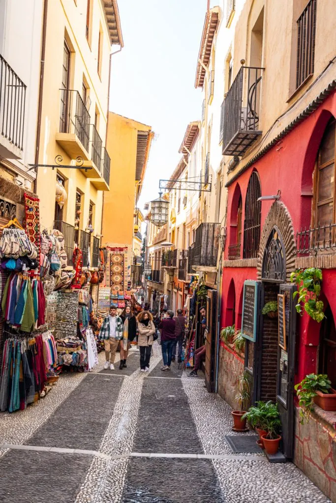 colorful street in albayzin granada, fun stop on a 10 day southern spain road trip itinerary