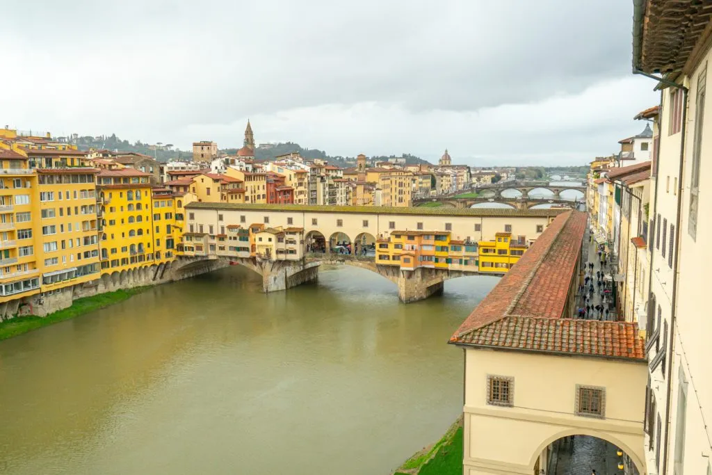 view of ponte vecchio and arno river from uffizi gallery