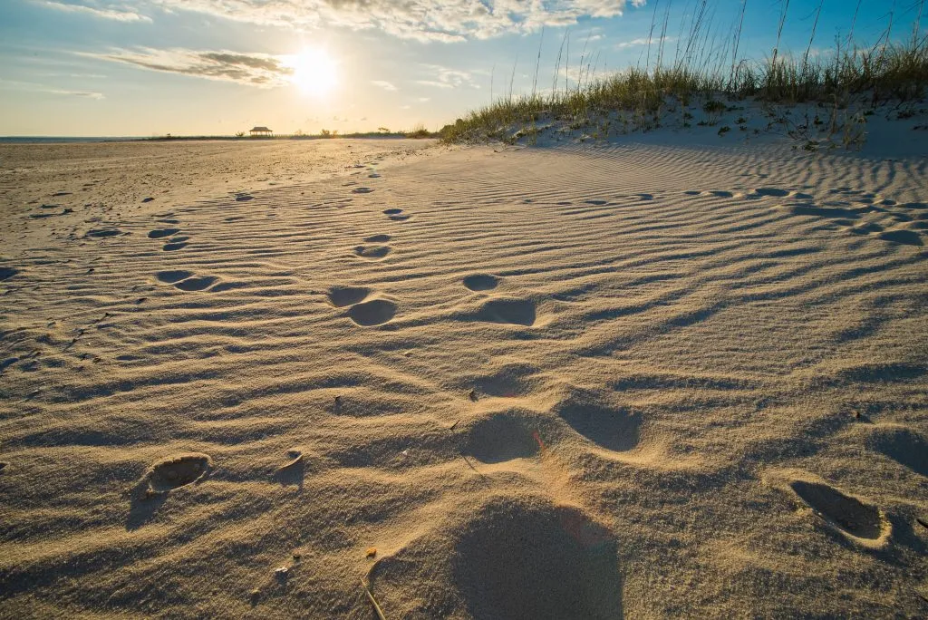 beach at sunset in mississippi as seen on southeast usa road trip route