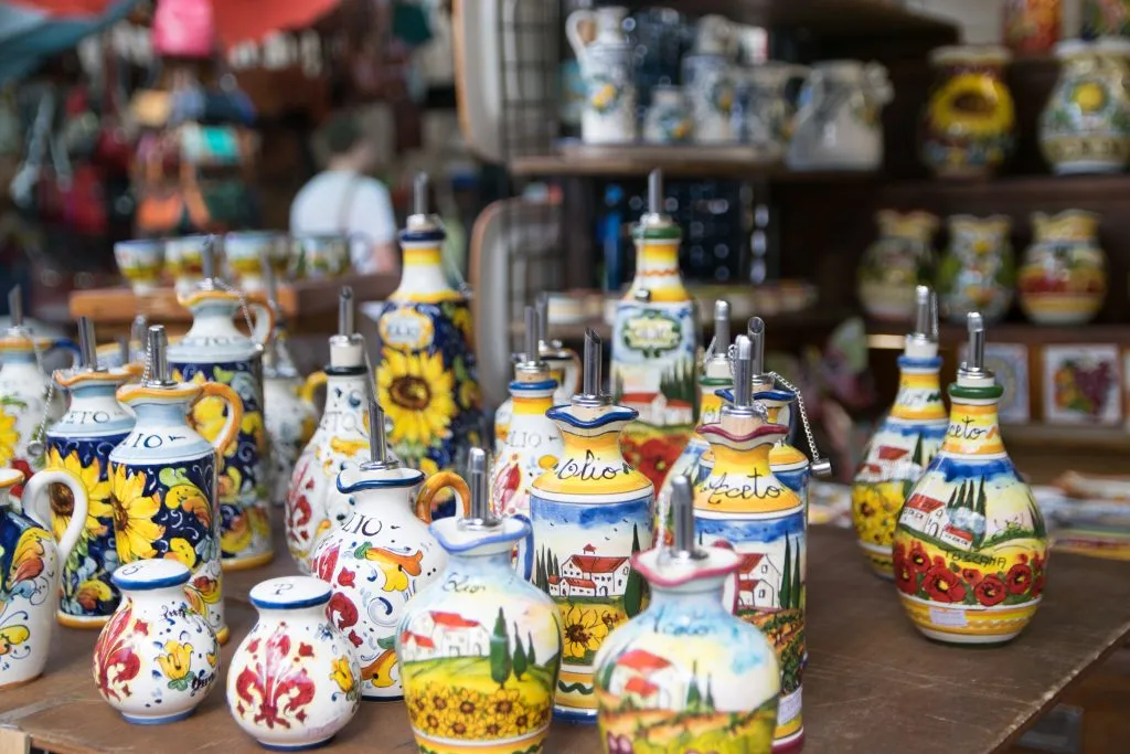 ceramics for sale on a wood table in tuscany italy