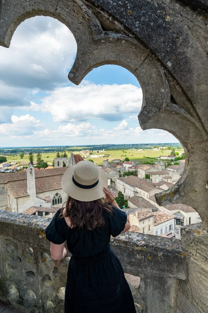 kate storm on top of st emilion bell tower facing away from camera