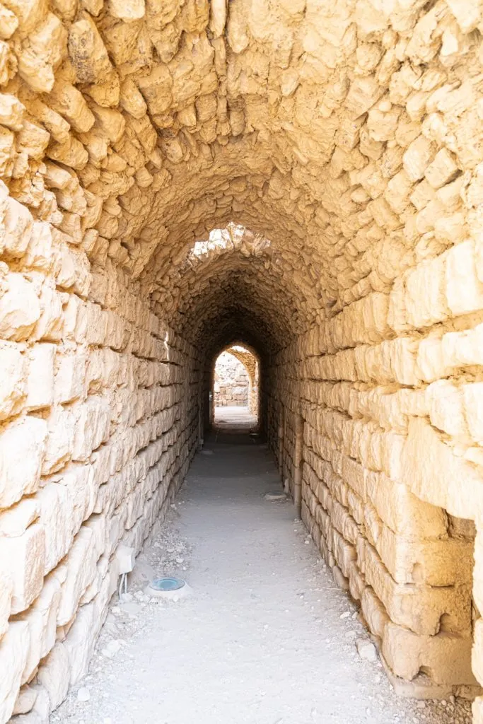 arched stone pathway in kerak castle jordan