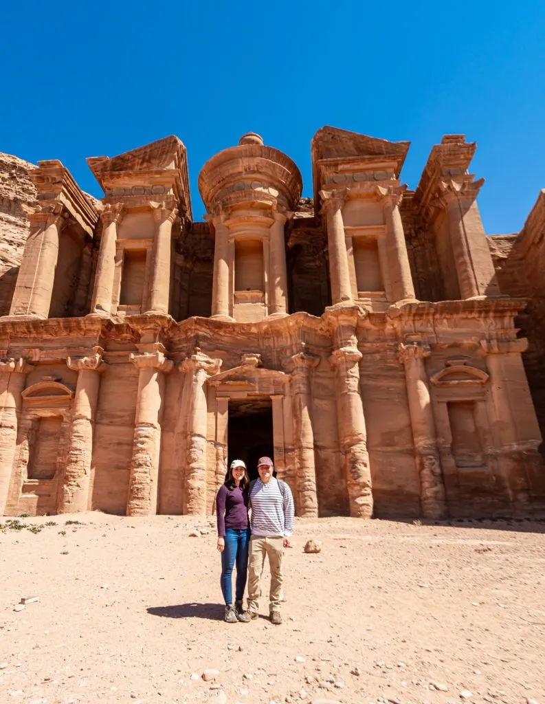 kate storm and jeremy storm in front of the monastery petra jordan itinerary