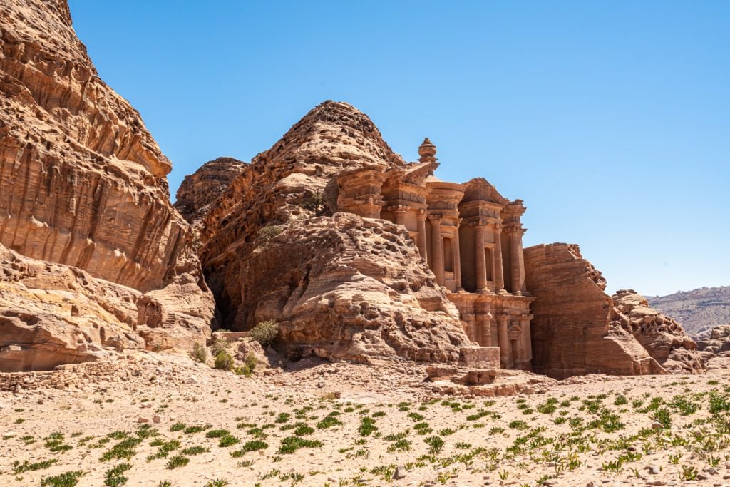 monastery peeking out of the rocks from petra back door hike