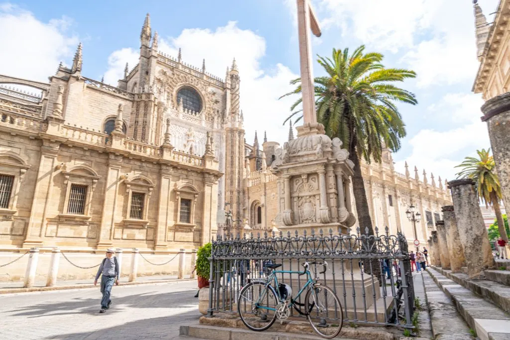 facade of the seville cathedral as seen from across a square