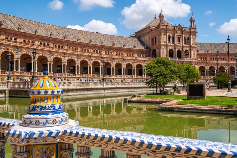 view of the plaza de espana from a bridge during one day in seville spain