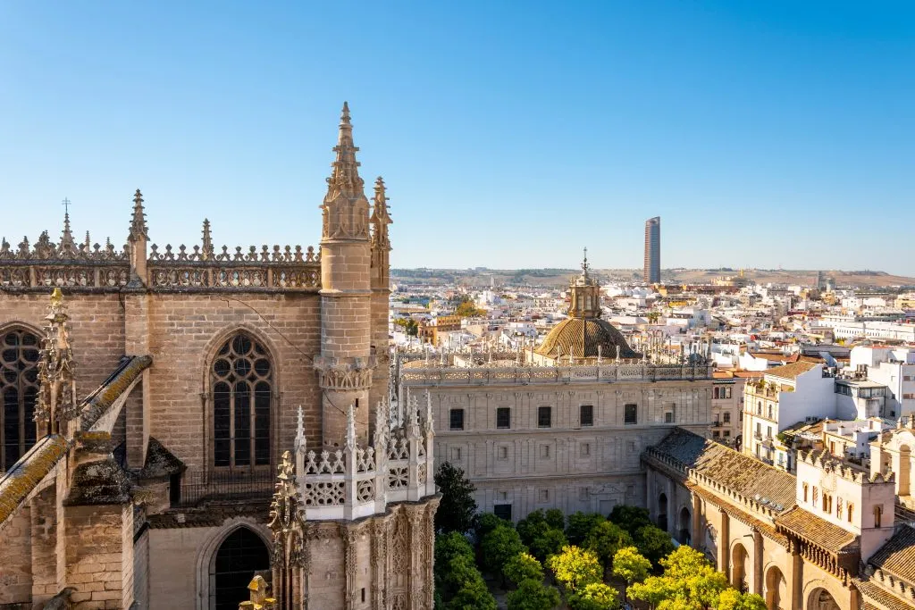 view of seville cathedral and patio de las naranjas from the giralda