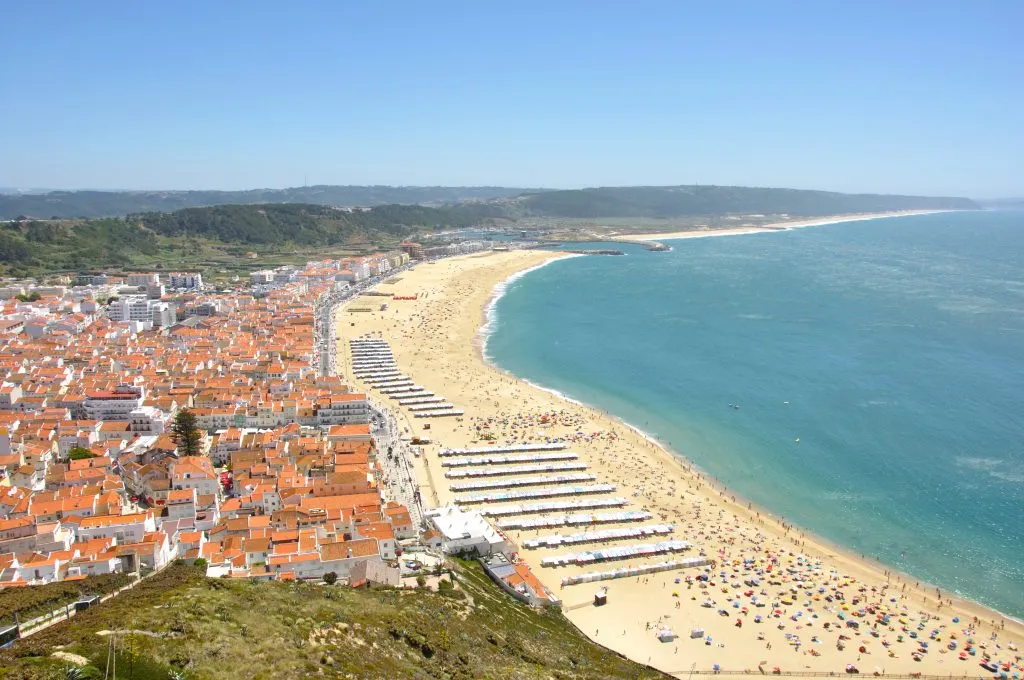 beach in nazare portugal from above road trip