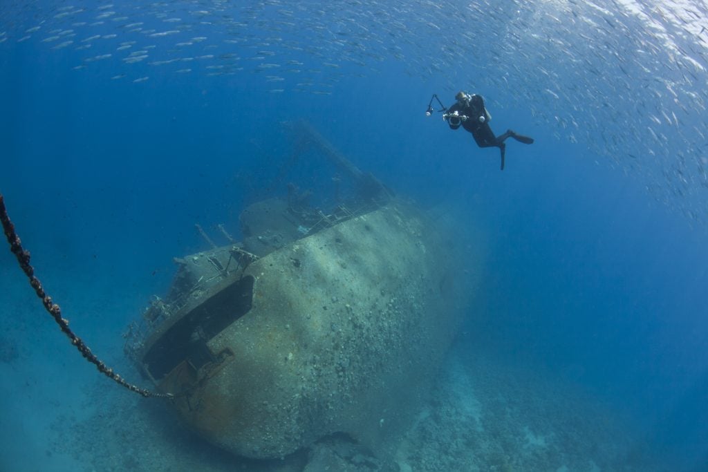 wreck dive in aqaba jordan with diver visible on the right of the photo