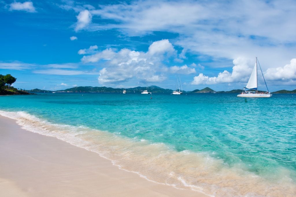 caribbean beach st john us virgin islands with sailboats on the water
