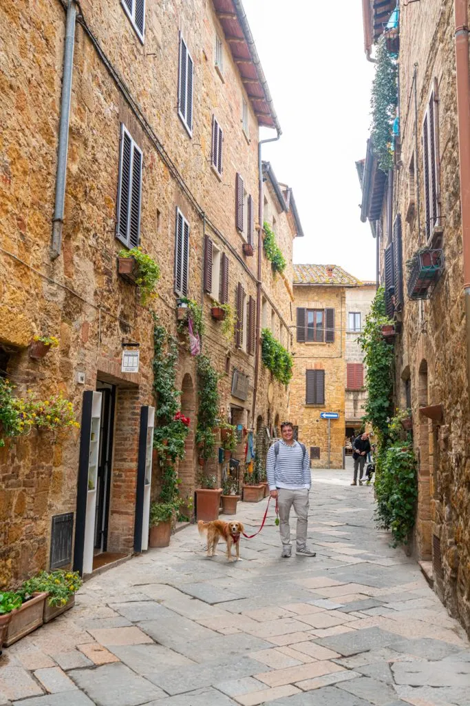 jeremy storm and ranger storm on a picturesque street in pienza