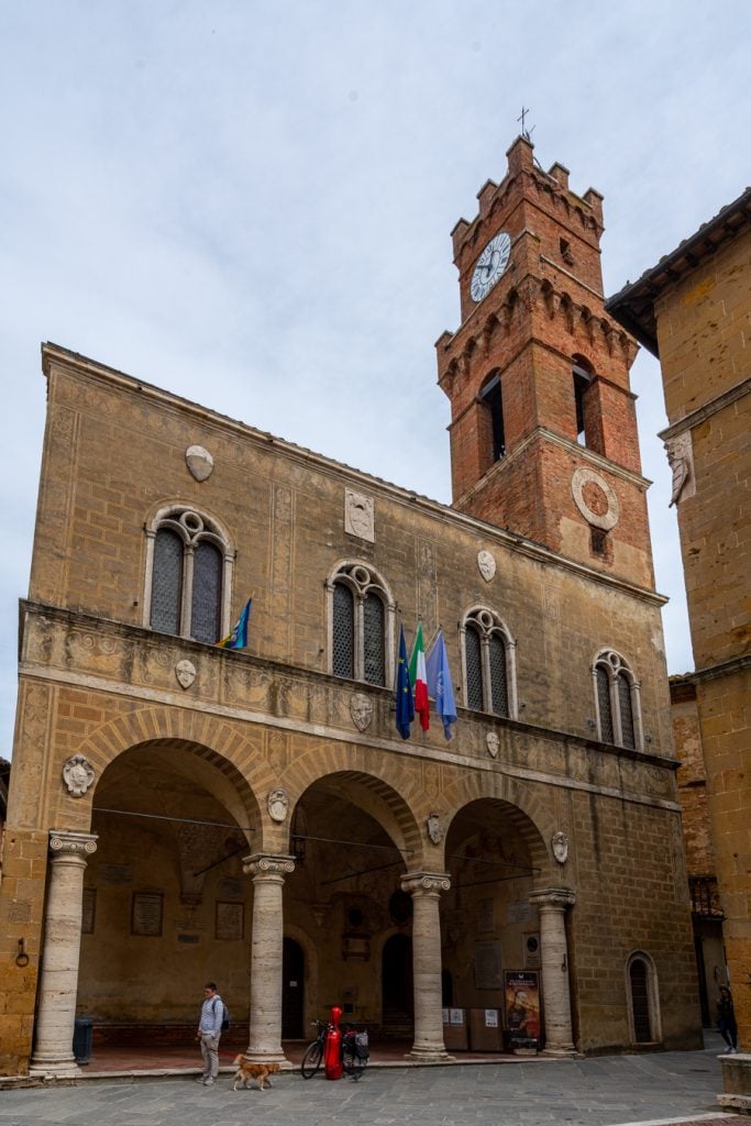 clock tower in main piazza of pienza italy