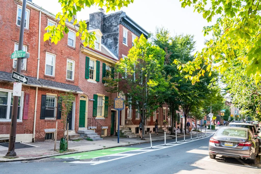 colonial style homes on a street in old city philadelphia travel guide