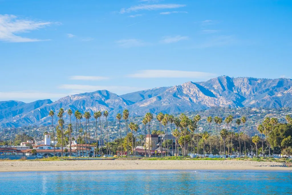 palm trees of santa barbara as seen from the ocean during a vacation california travel destination