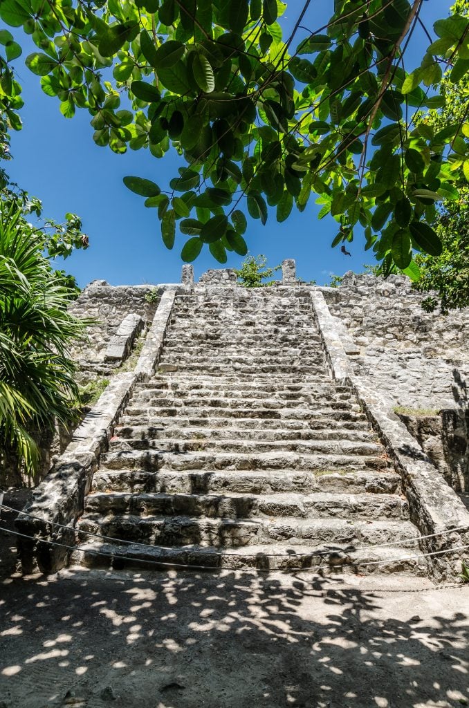 mayan pyramid in san miguelito cancun mayan museum as seen from the ground