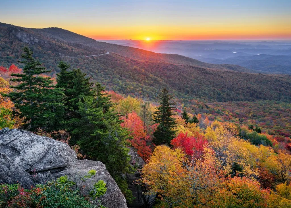 sunrise during fall foliage season along blue ridge parkway western nc