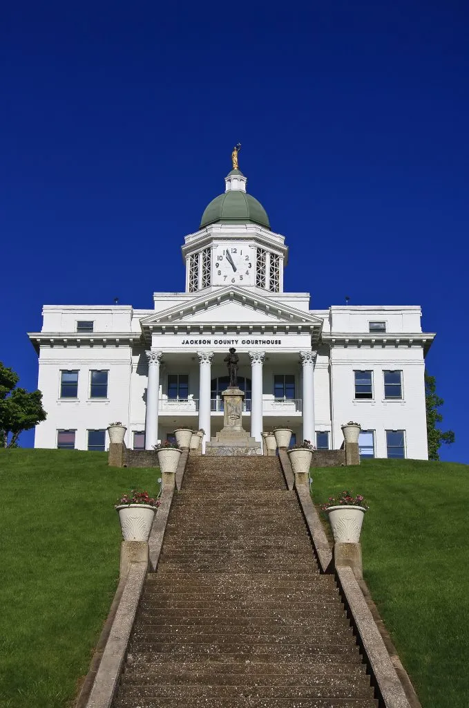 white courthouse with clocktower in sylva north carolina, one of the best mountain towns nc