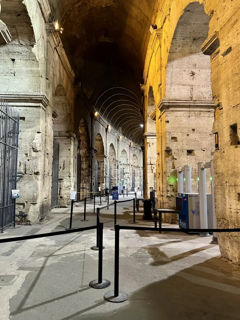 empty entrance to colosseum after hours showing no lines