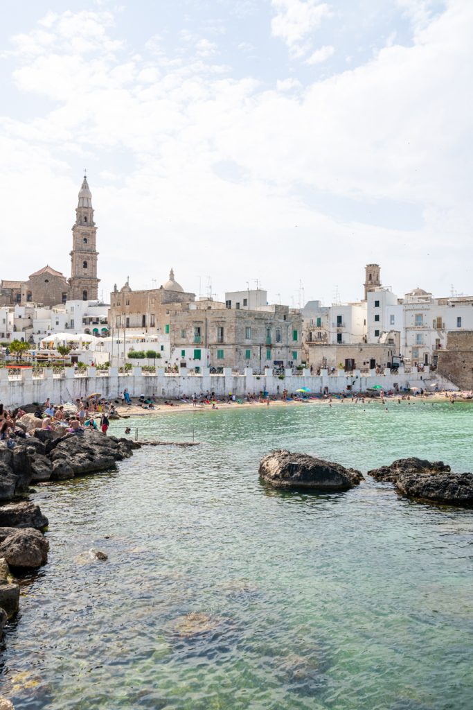 monopoli italy as seen from across the water at cala porta vecchia