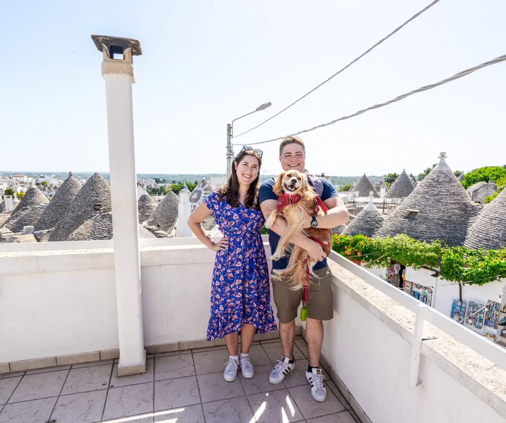 kate storm jeremy storm and ranger storm on a terrace overlooking trulli alberobello puglia 7 day itinerary